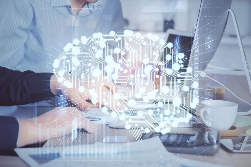 Tech consultants working at a laptop with holographic brain and data overlay — illustration of OnTerra Systems' Bing Maps migration consulting expertise